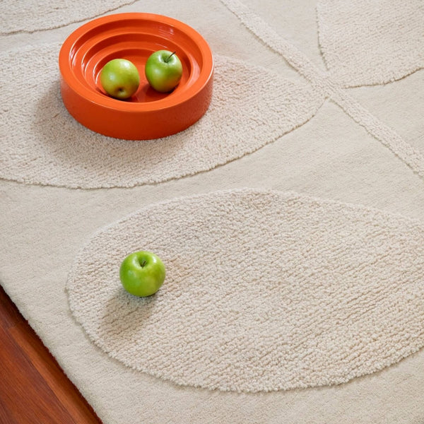 Close up of Solid Stem Ecru Rug by Orla Kiely